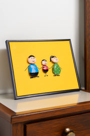 Hand-Painted Pebble Art — Our Family of Three Pebble Art · Hand-Painted · Framed · One of a Kind