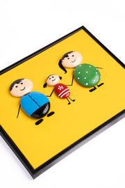 Hand-Painted Pebble Art — Our Family of Three Pebble Art · Hand-Painted · Framed · One of a Kind