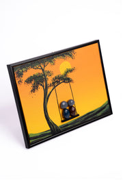Hand-Painted Pebble Art — Family on the Swing at Sunset Pebble Art · Hand-Painted · Framed · One of a Kind
