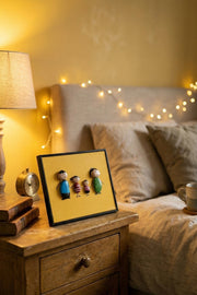 Hand-Painted Pebble Art — Our Happy Family of Four Pebble Art · Hand-Painted · Framed · One of a Kind